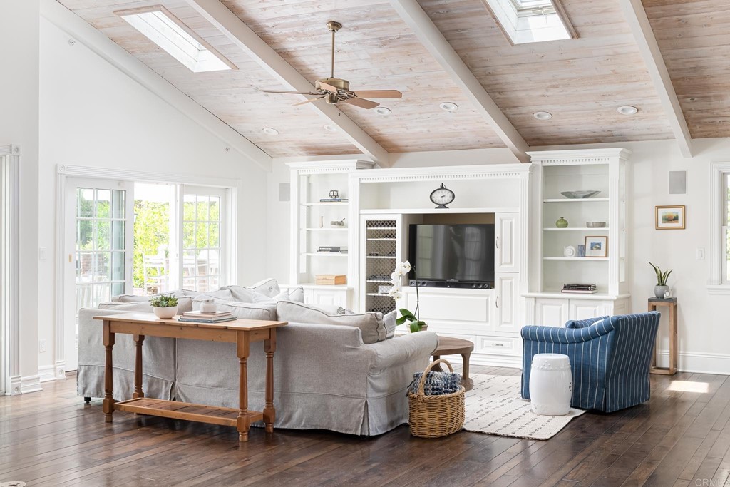 710 Cole Ranch Road Encinitas, CA 92024 - Photo 15 of 51 a living room with furniture and a flat screen tv