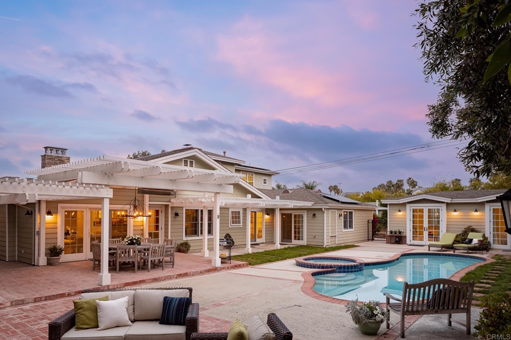 710 Cole Ranch Road Encinitas, CA 92024 - Photo 4 of 51 a front view of a house with yard swimming pool and outdoor seating