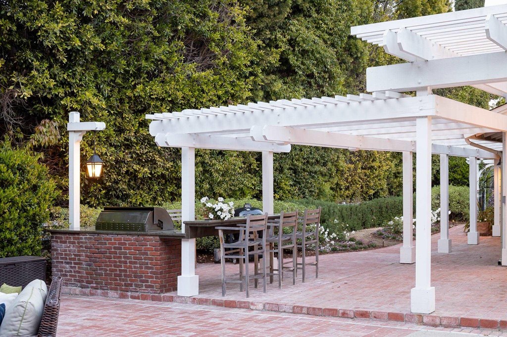 710 Cole Ranch Road Encinitas, CA 92024 - Photo 42 of 51 a patio with table and chairs