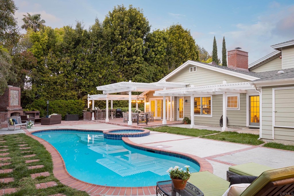710 Cole Ranch Road Encinitas, CA 92024 - Photo 45 of 51 a view of a house with swimming pool and sitting area