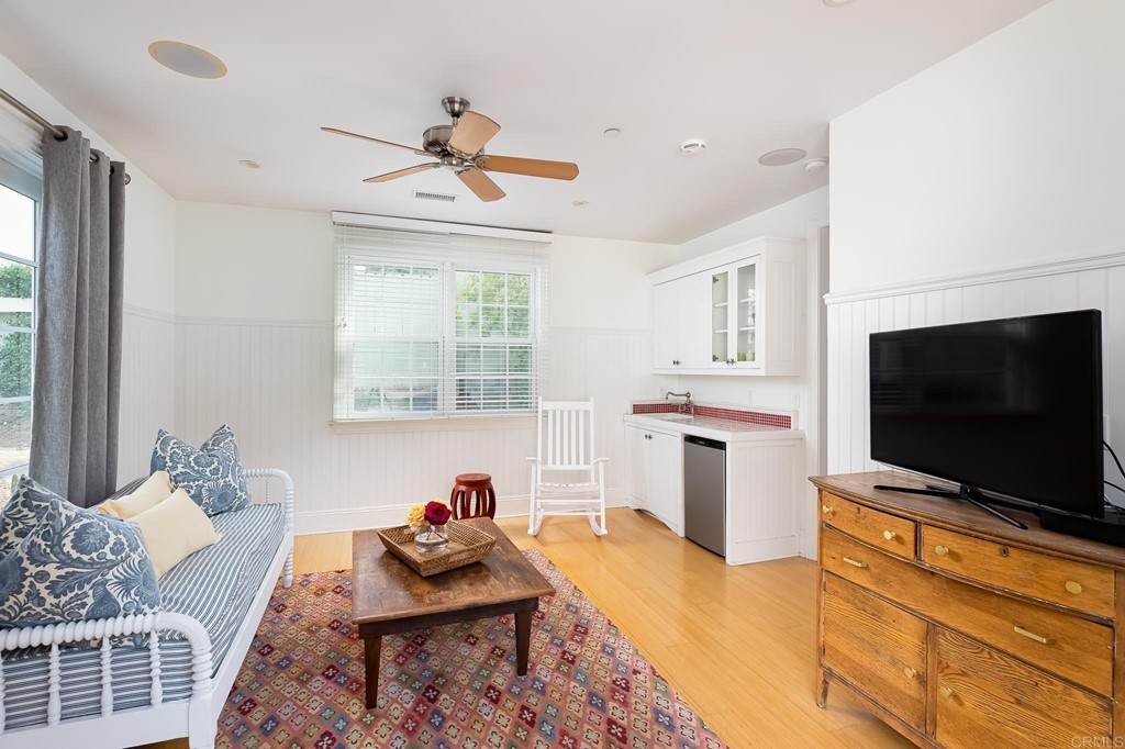 710 Cole Ranch Road Encinitas, CA 92024 - Photo 46 of 51 a living room with furniture and a flat screen tv