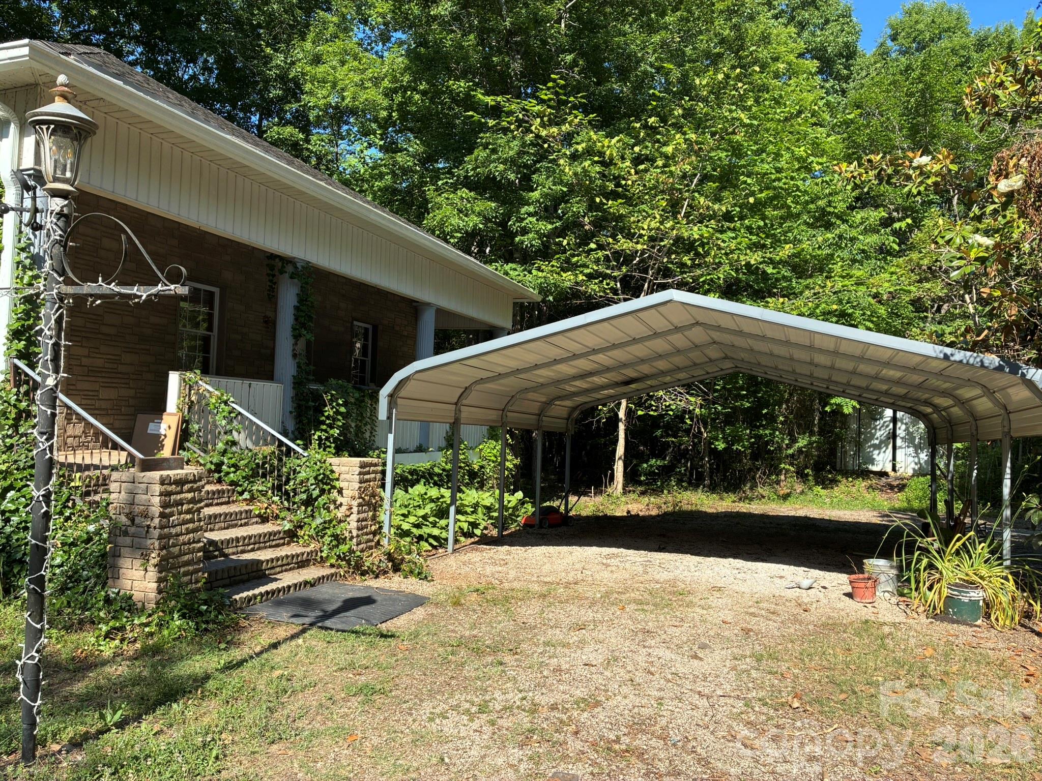 2051 Sutton Spring Road York, SC 29745 - Photo 5 of 47 a view of a house with a yard