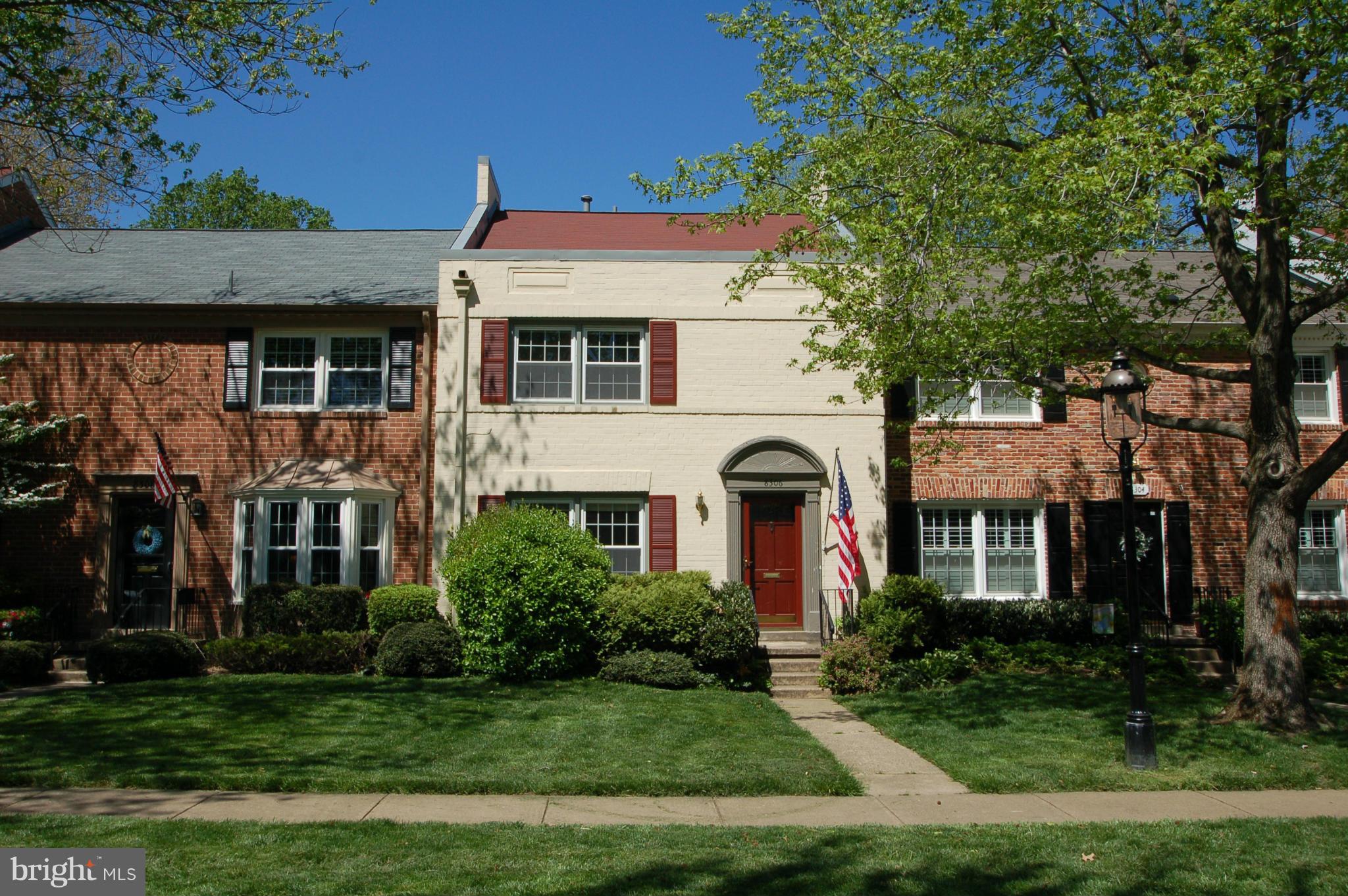 8306 Wickham Road Springfield, VA 22152 - Photo 1 of 29 a front view of a house with a yard