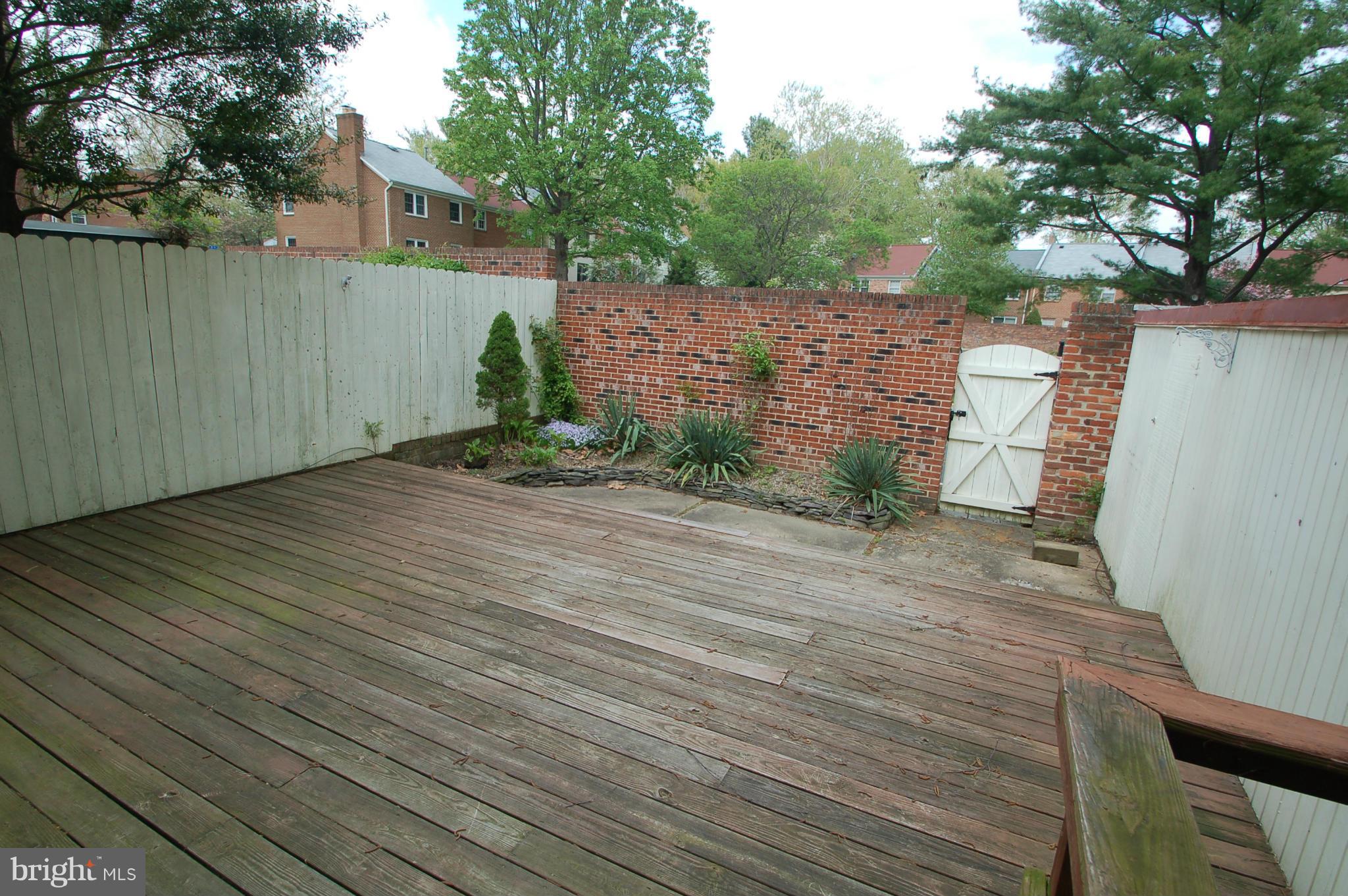 8306 Wickham Road Springfield, VA 22152 - Photo 12 of 29 a view of a backyard of the house