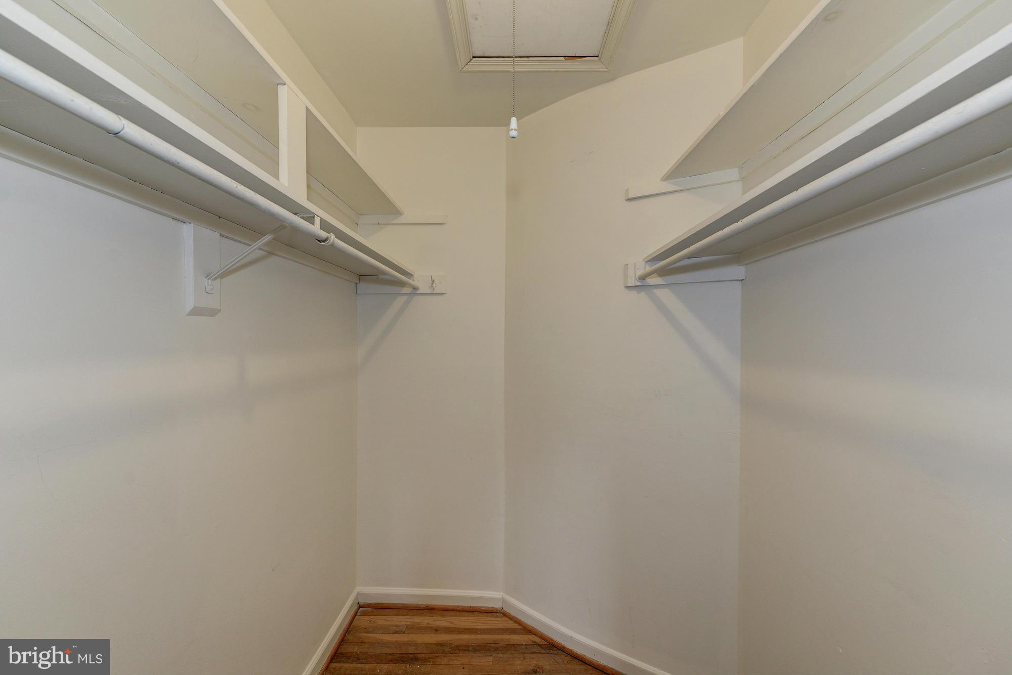 8306 Wickham Road Springfield, VA 22152 - Photo 19 of 29 a view of a room with racks on the wall