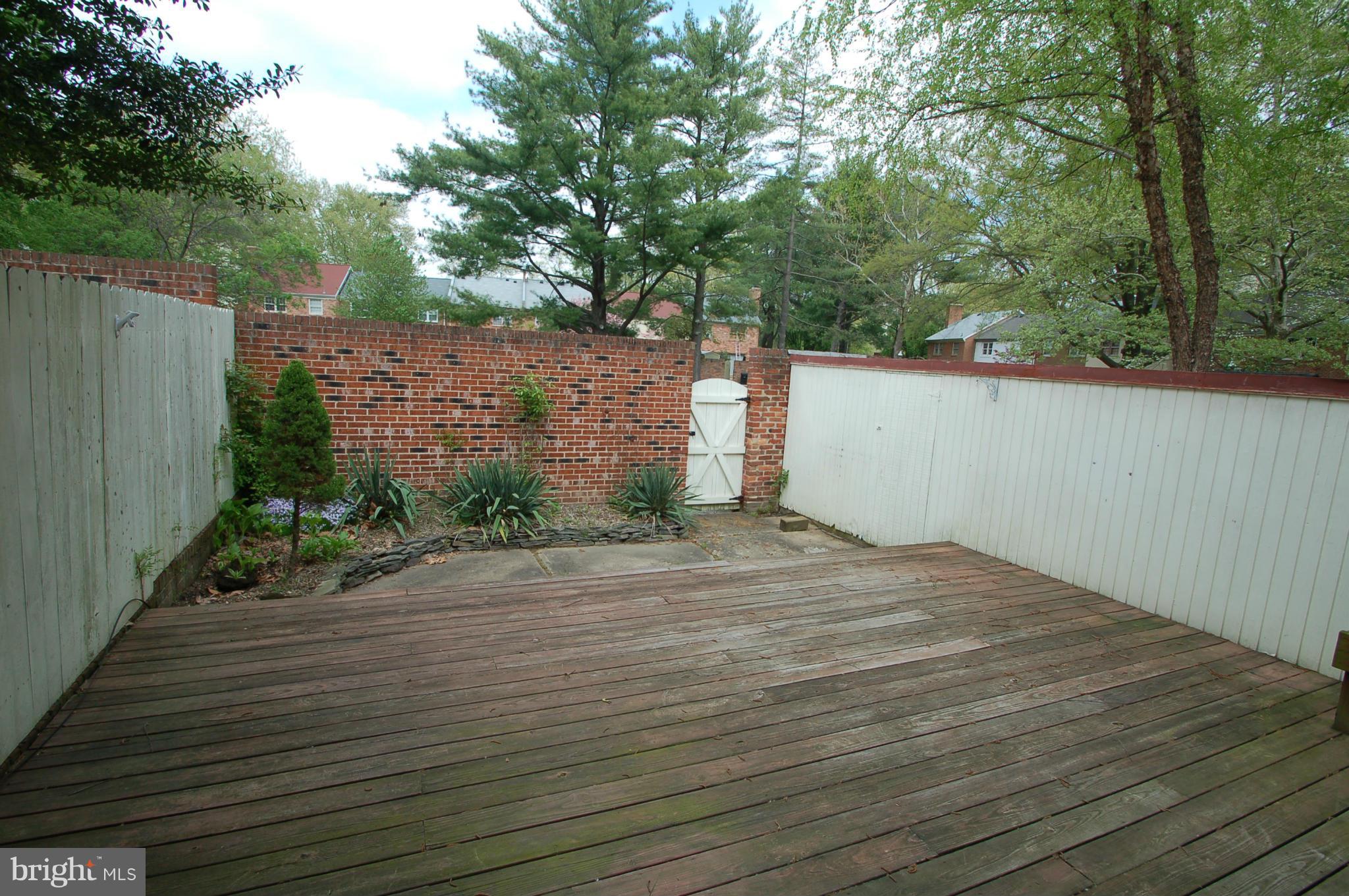 8306 Wickham Road Springfield, VA 22152 - Photo 23 of 29 a view of a backyard of the house