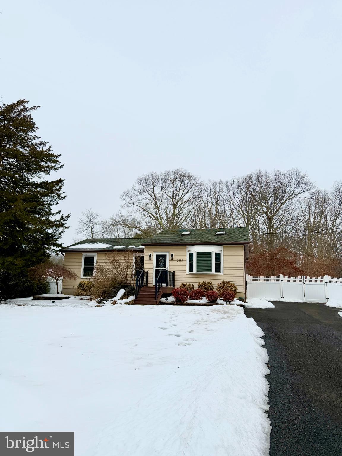 2883 Williamstown Road Franklinville, NJ 08322 - Photo 1 of 8 a view of house with a yard covered in snow