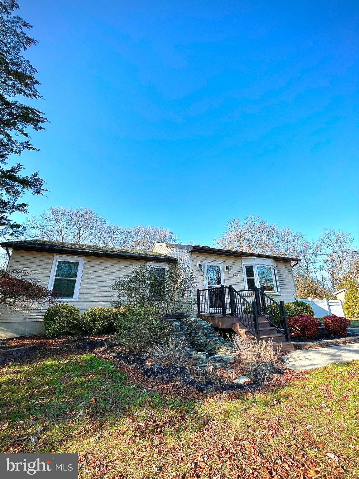 2883 Williamstown Road Franklinville, NJ 08322 - Photo 2 of 8 a front view of a house with garden