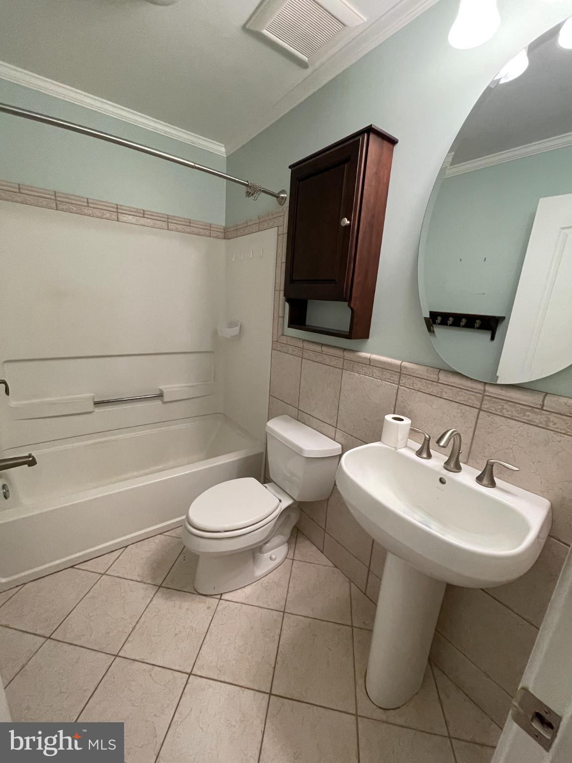 2883 Williamstown Road Franklinville, NJ 08322 - Photo 7 of 8 a bathroom with a sink toilet and shower