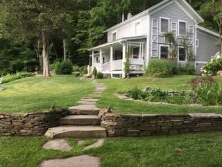 182 Lcpl Jacob Beisel Road Lackawaxen, PA 18435 - Photo 1 of 1 a front view of a house with a yard