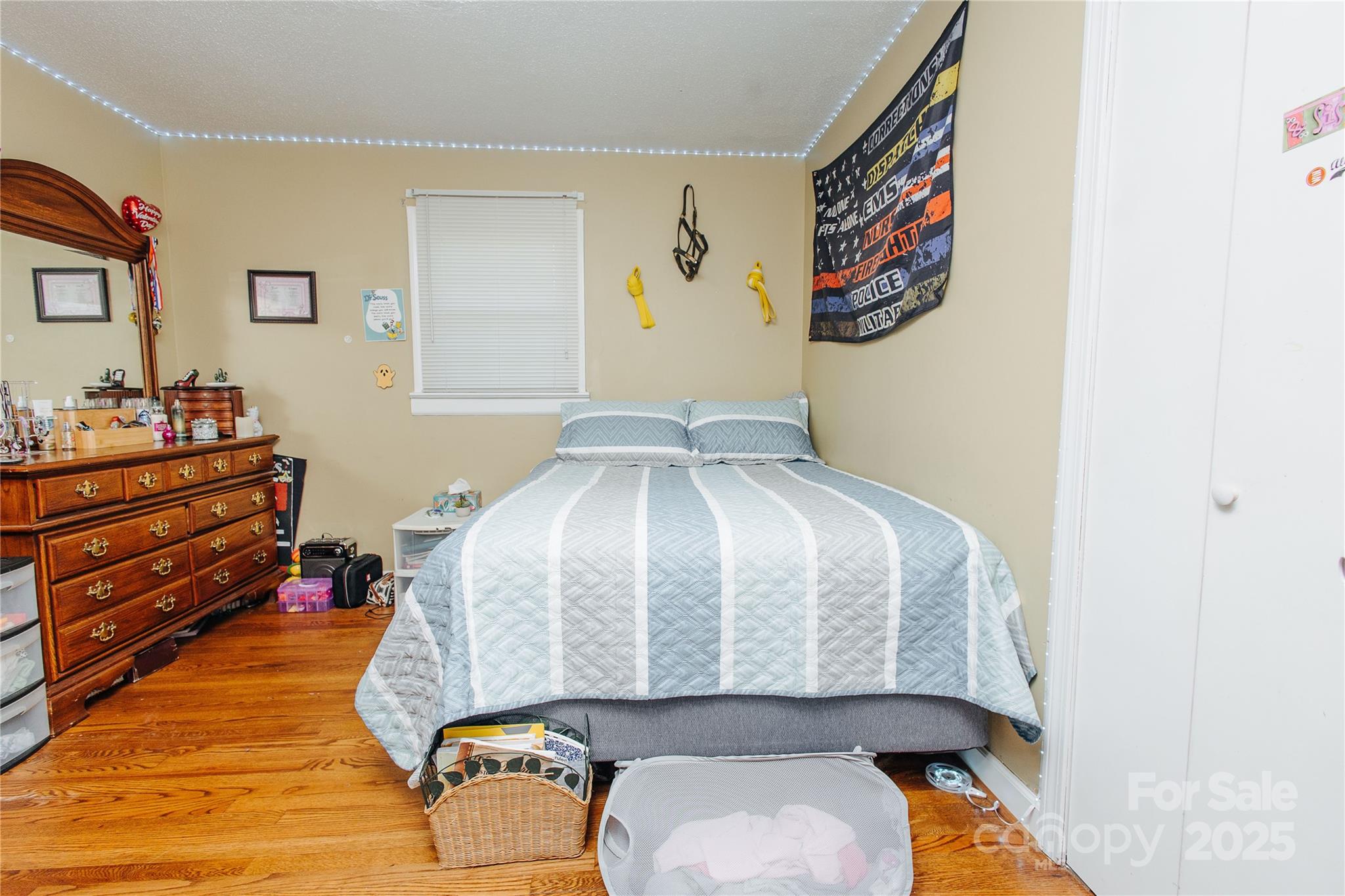 98 Long Street Marion, NC 28752 - Photo 13 of 30 a bedroom with a bed and dresser