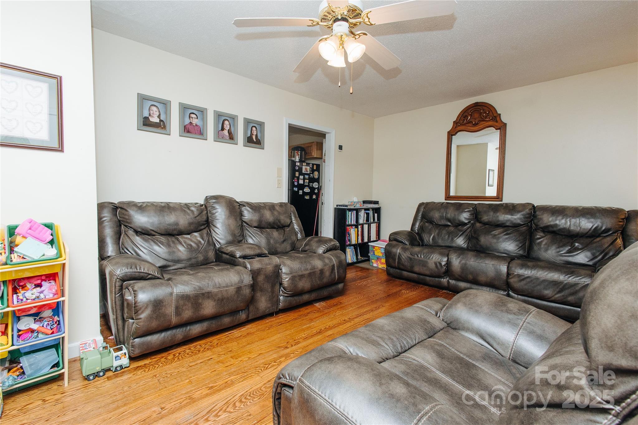 98 Long Street Marion, NC 28752 - Photo 27 of 30 a living room with furniture a couch and a window