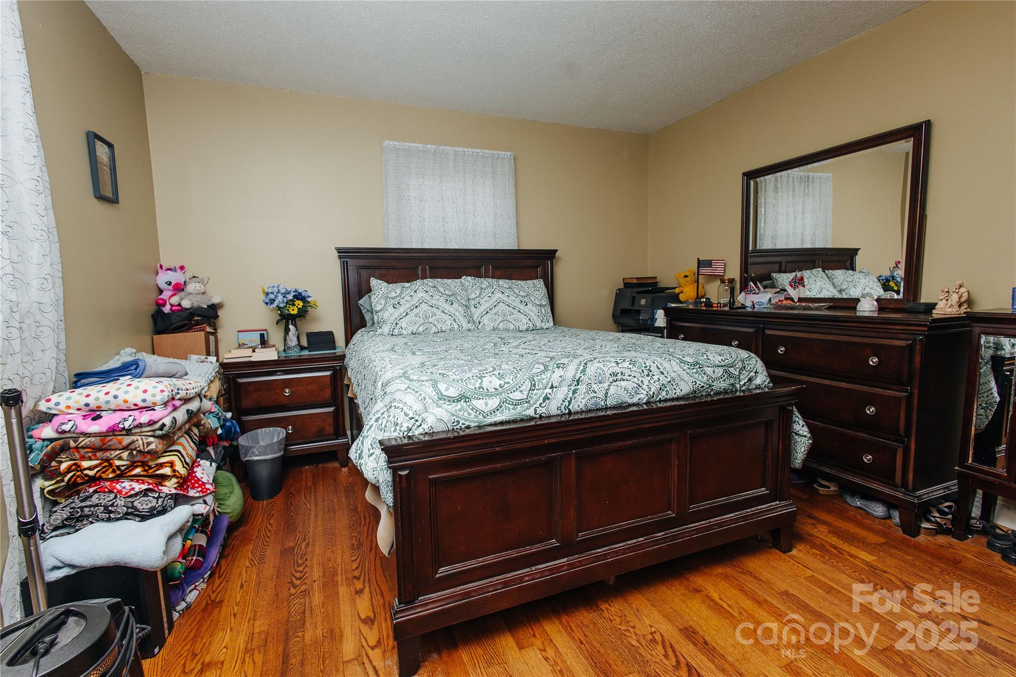 98 Long Street Marion, NC 28752 - Photo 7 of 30 a bedroom with a bed and a dresser in it