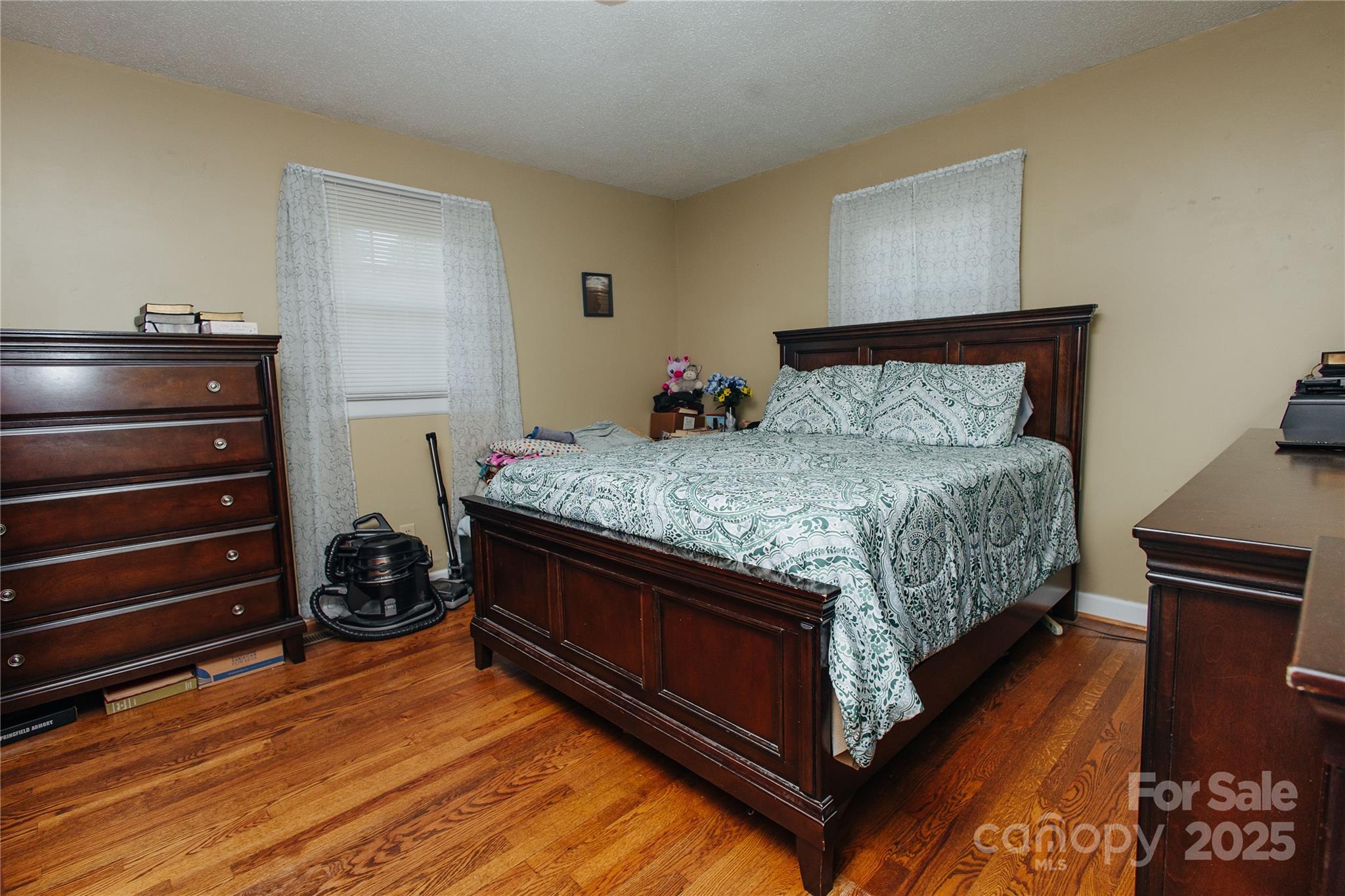 98 Long Street Marion, NC 28752 - Photo 8 of 30 a bedroom with a bed and a dresser