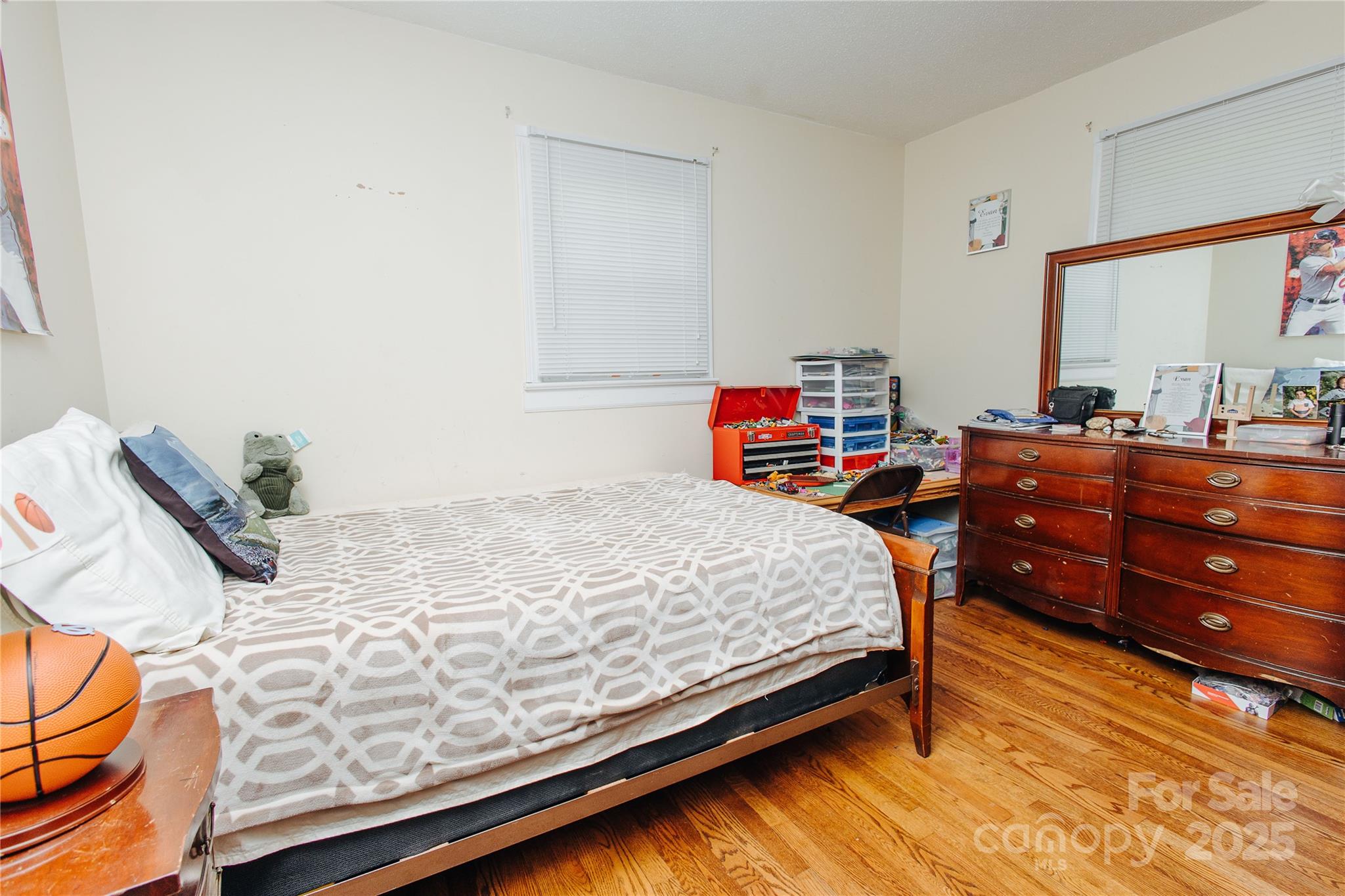 98 Long Street Marion, NC 28752 - Photo 9 of 30 a bed room with a bed and a dresser