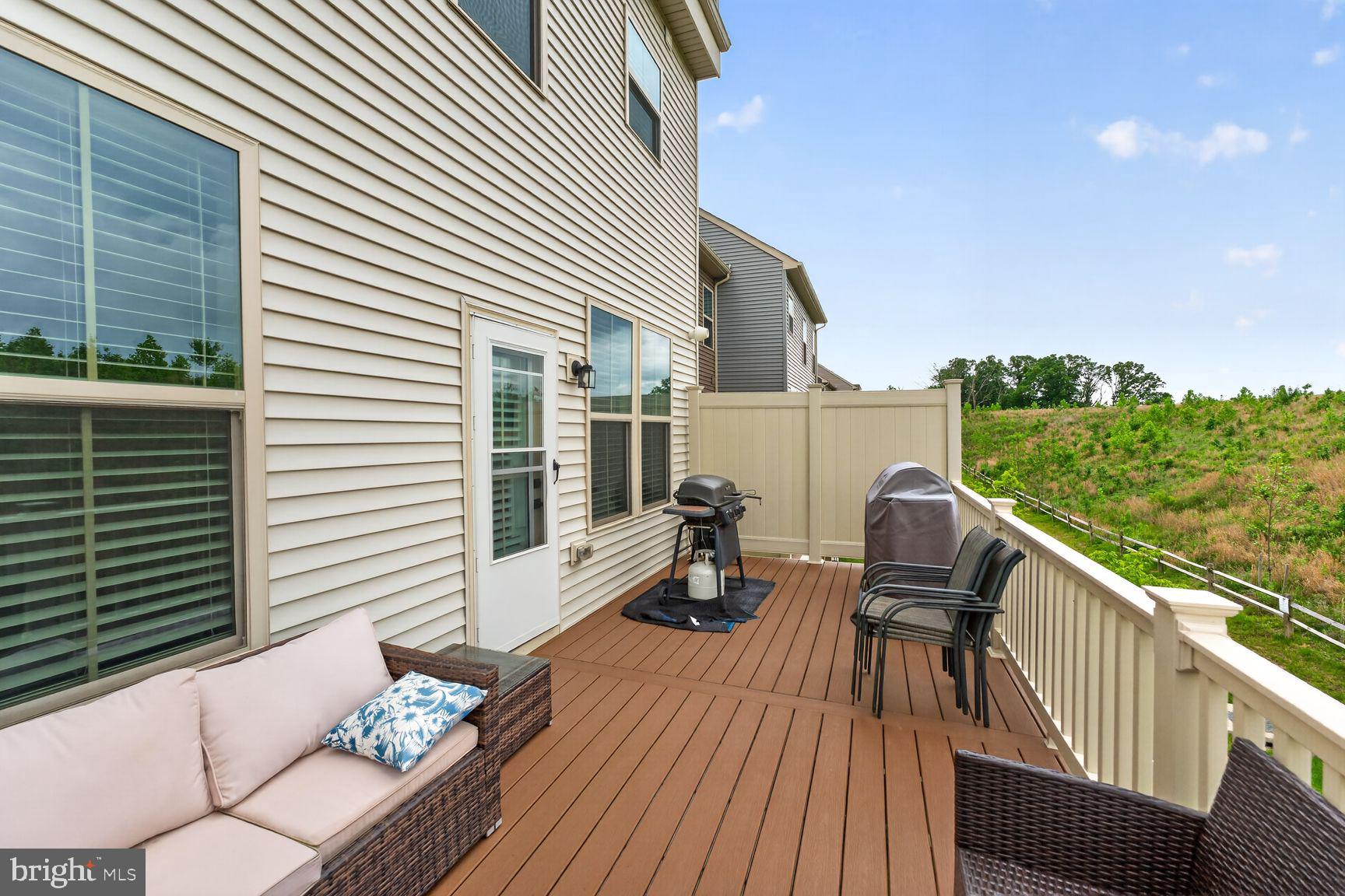 14963 Ring House Road, Unit D Brandywine, MD 20613 - Photo 7 of 31 CUSTOM BUILT MAIN-LEVEL ENTERTAINMENT DECK