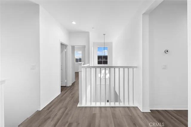 a bathroom with a bath tub sink mirror and a shower