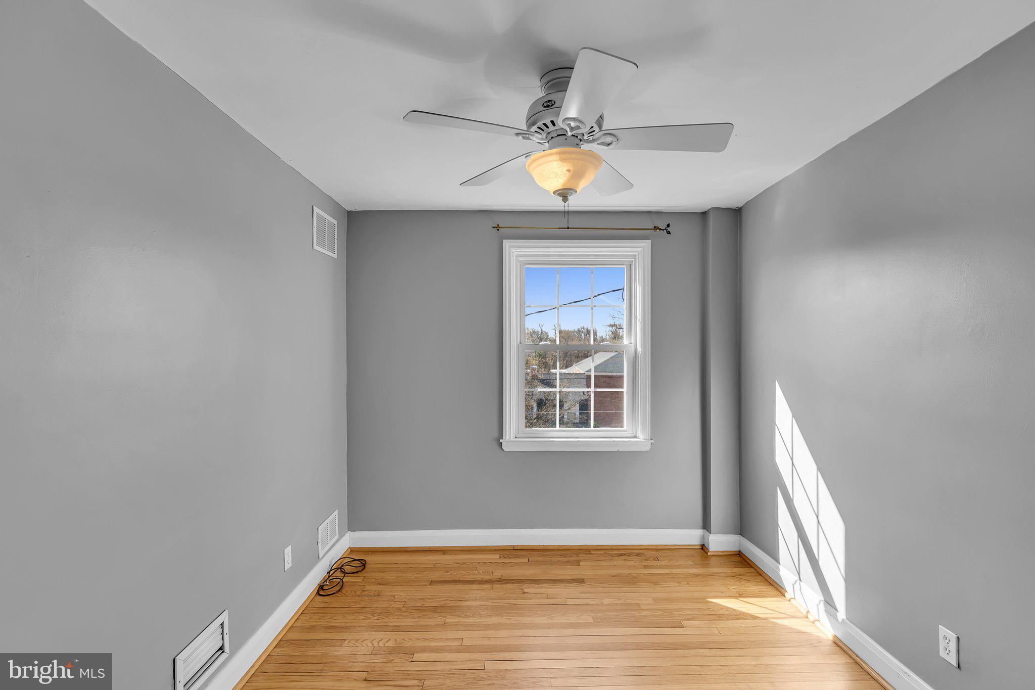 6147 Regent Park Road Catonsville, MD 21228 - Photo 15 of 22 a view of an empty room and window