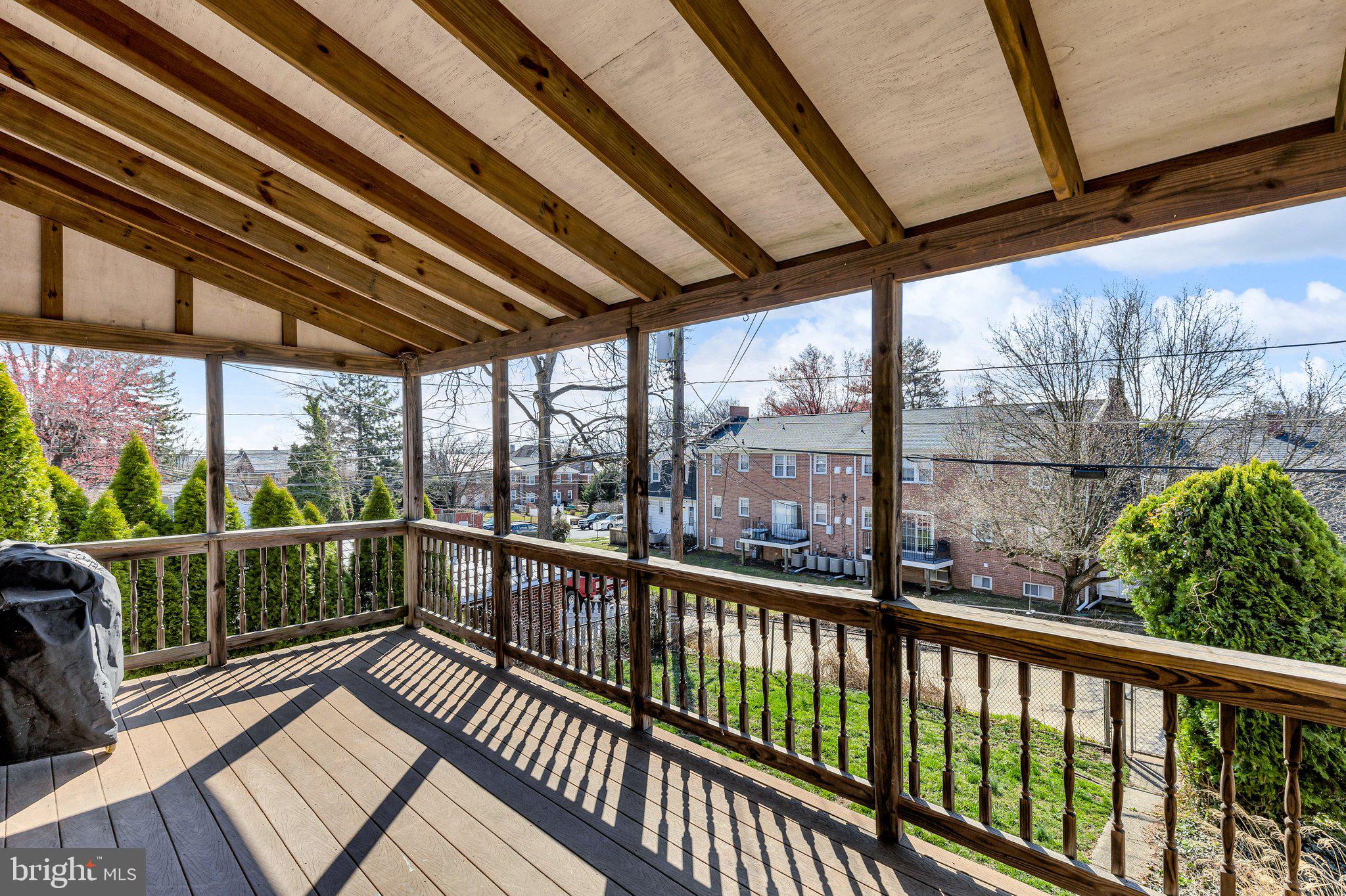 6147 Regent Park Road Catonsville, MD 21228 - Photo 20 of 22 a view of a balcony with wooden floor