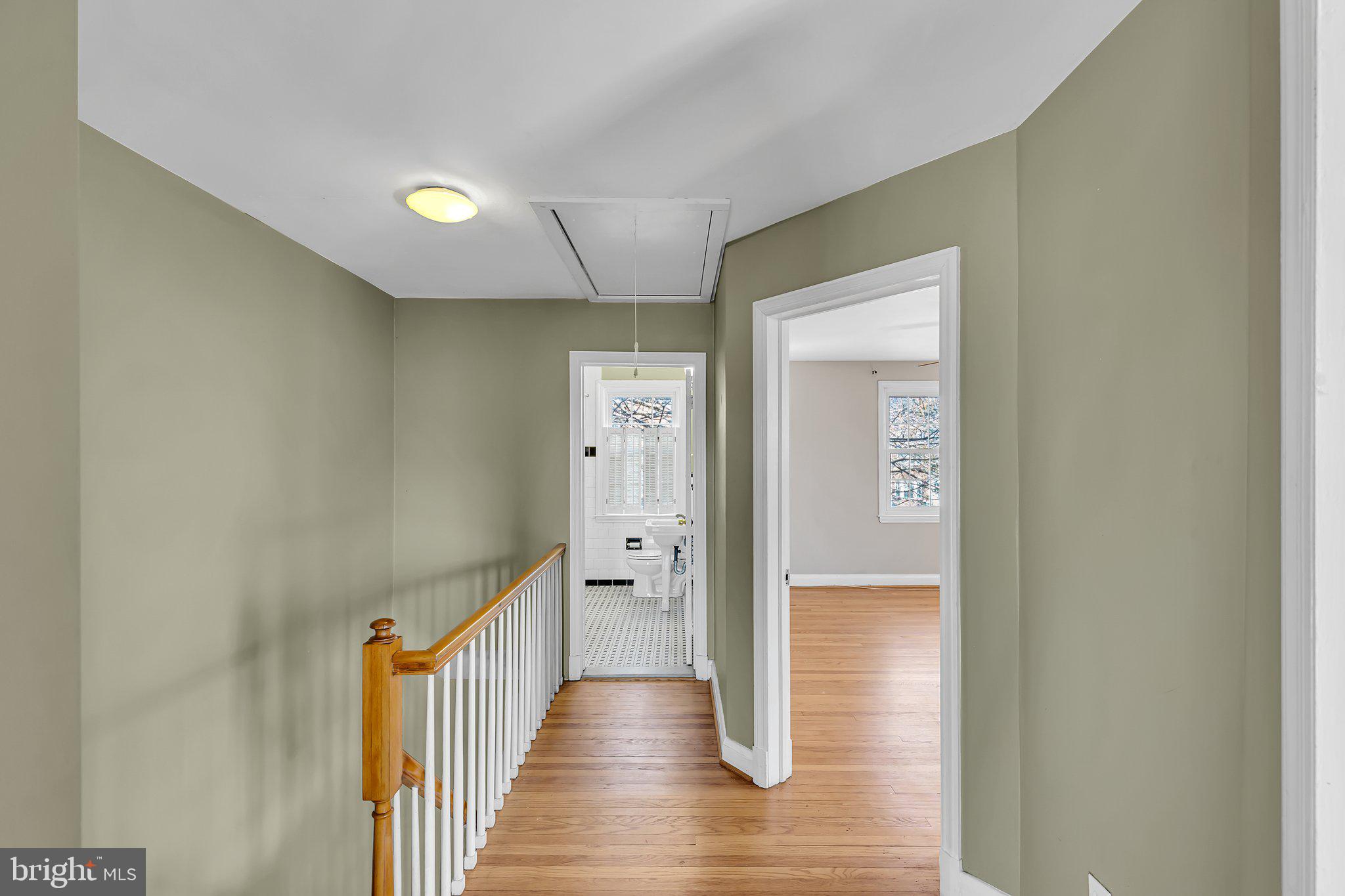6147 Regent Park Road Catonsville, MD 21228 - Photo 10 of 22 a view of a hallway with wooden floor