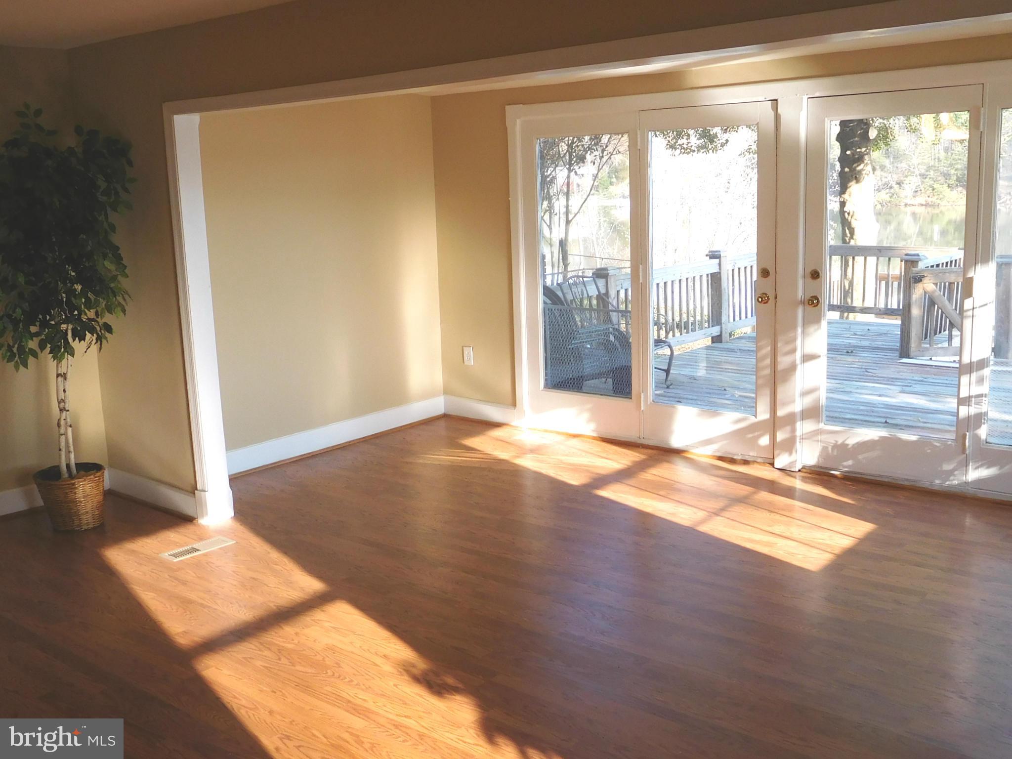 842 Riverside Drive Pasadena, MD 21122 - Photo 11 of 25 French doors leading to deck