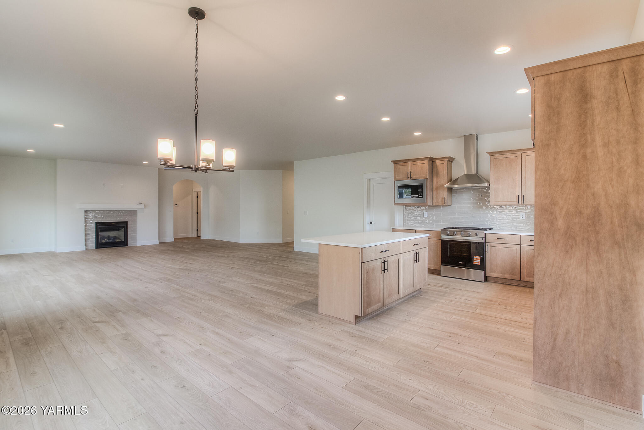 404 South 90th Avenue Yakima, WA 98908 - Photo 12 of 20 a view of a kitchen with a sink stainless steel appliances and cabinets