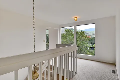 a view of a hallway with window