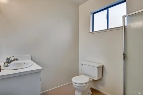 a bathroom with a sink and a toilet