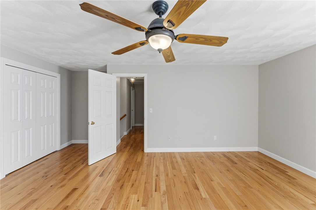21 Casey Lane Coventry, RI 02816 - Photo 16 of 48 primary bedroom with gleaming hardwood floors