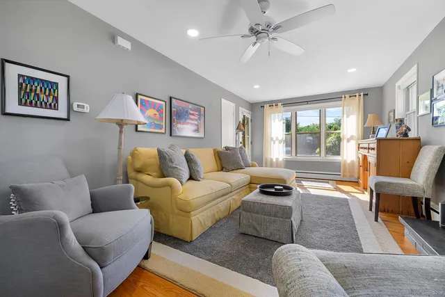 a living room with furniture and a couch