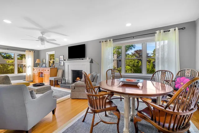 a view of a dining room with furniture window and outside view