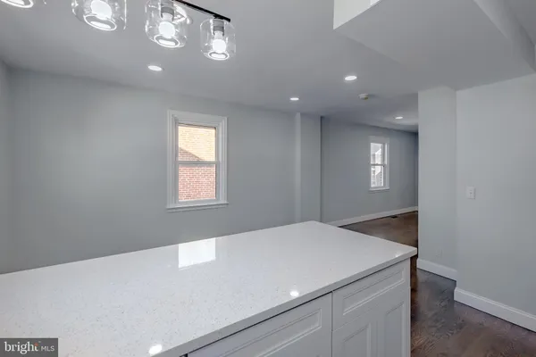 a view of hallway with windows