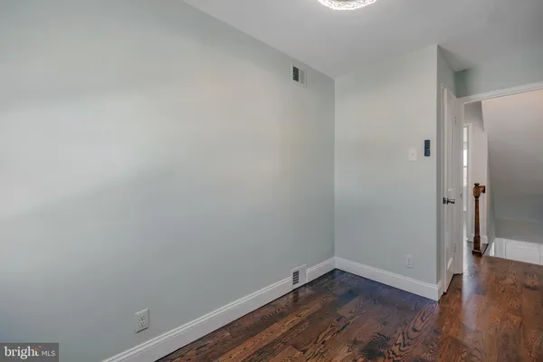 a view of small space with wooden floor