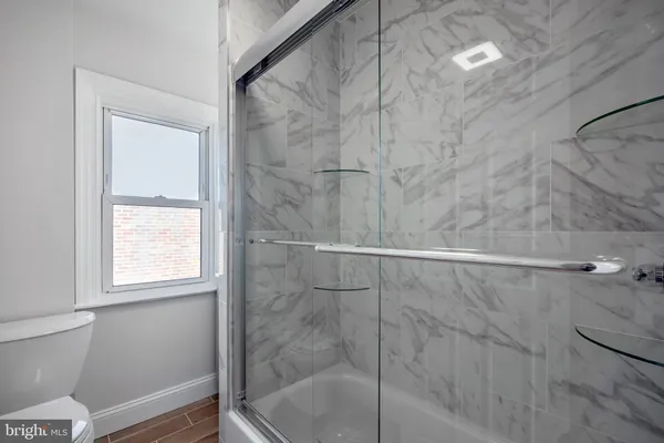 a bathroom with a bathtub