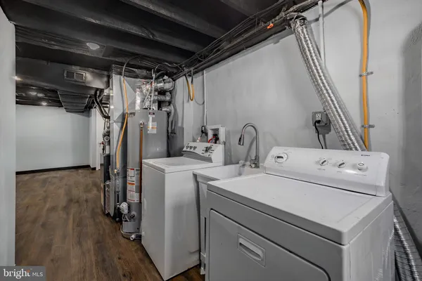 a utility room with dryer and washer