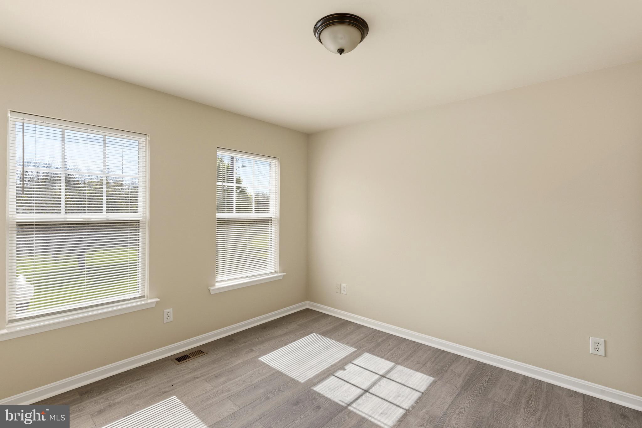 4704 Denview Way Baltimore, MD 21206 - Photo 17 of 42 an empty room with windows