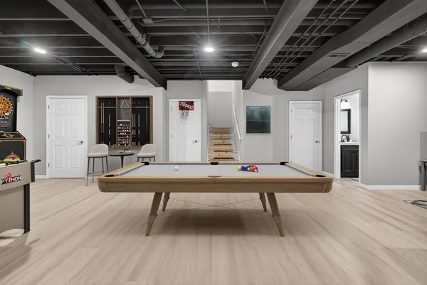 a room with furniture pool table table tennis pool table and windows