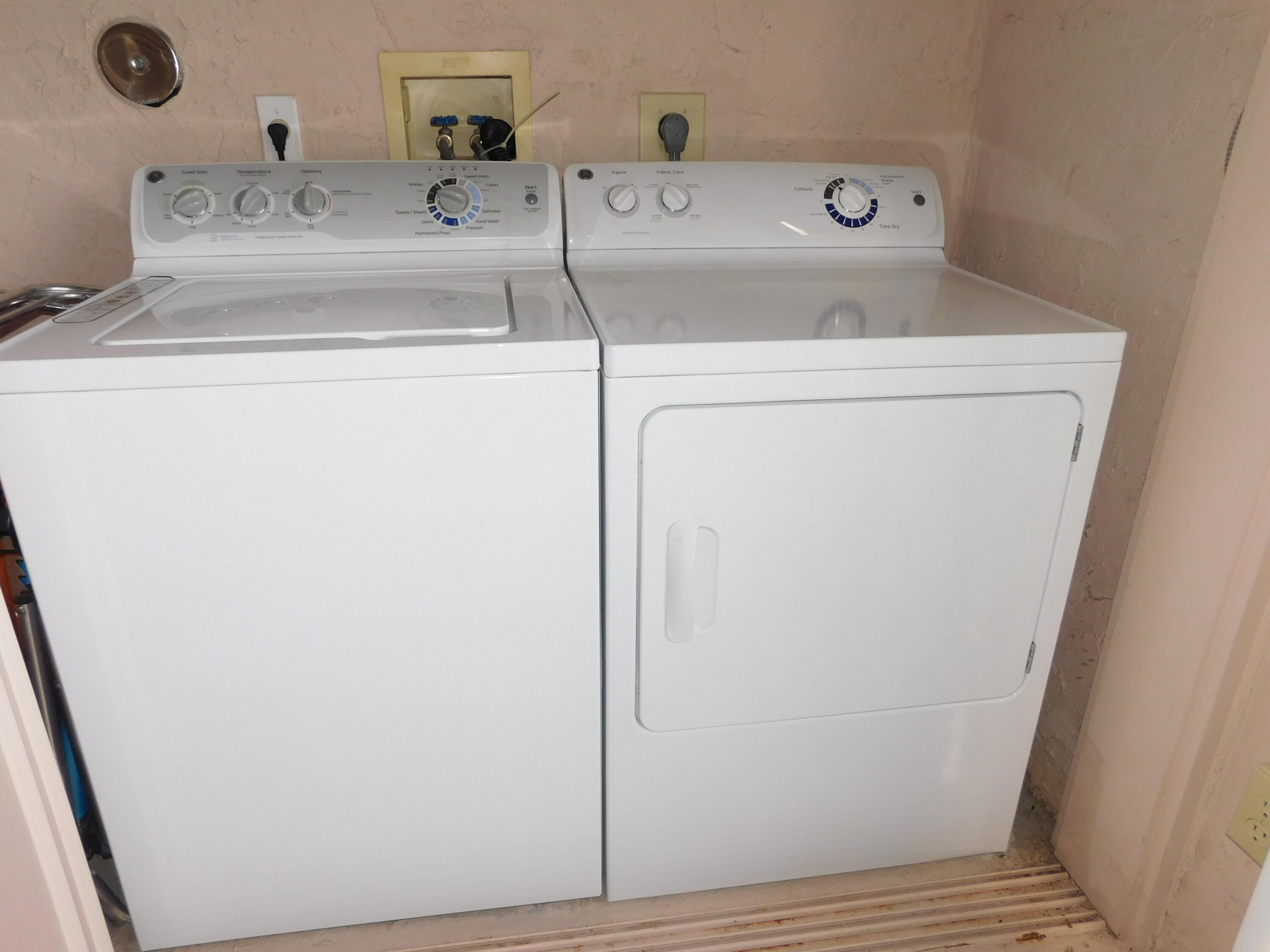 5235 Europa Drive, Unit E Boynton Beach, FL 33437 - Photo 21 of 57 a utility room with dryer and washer