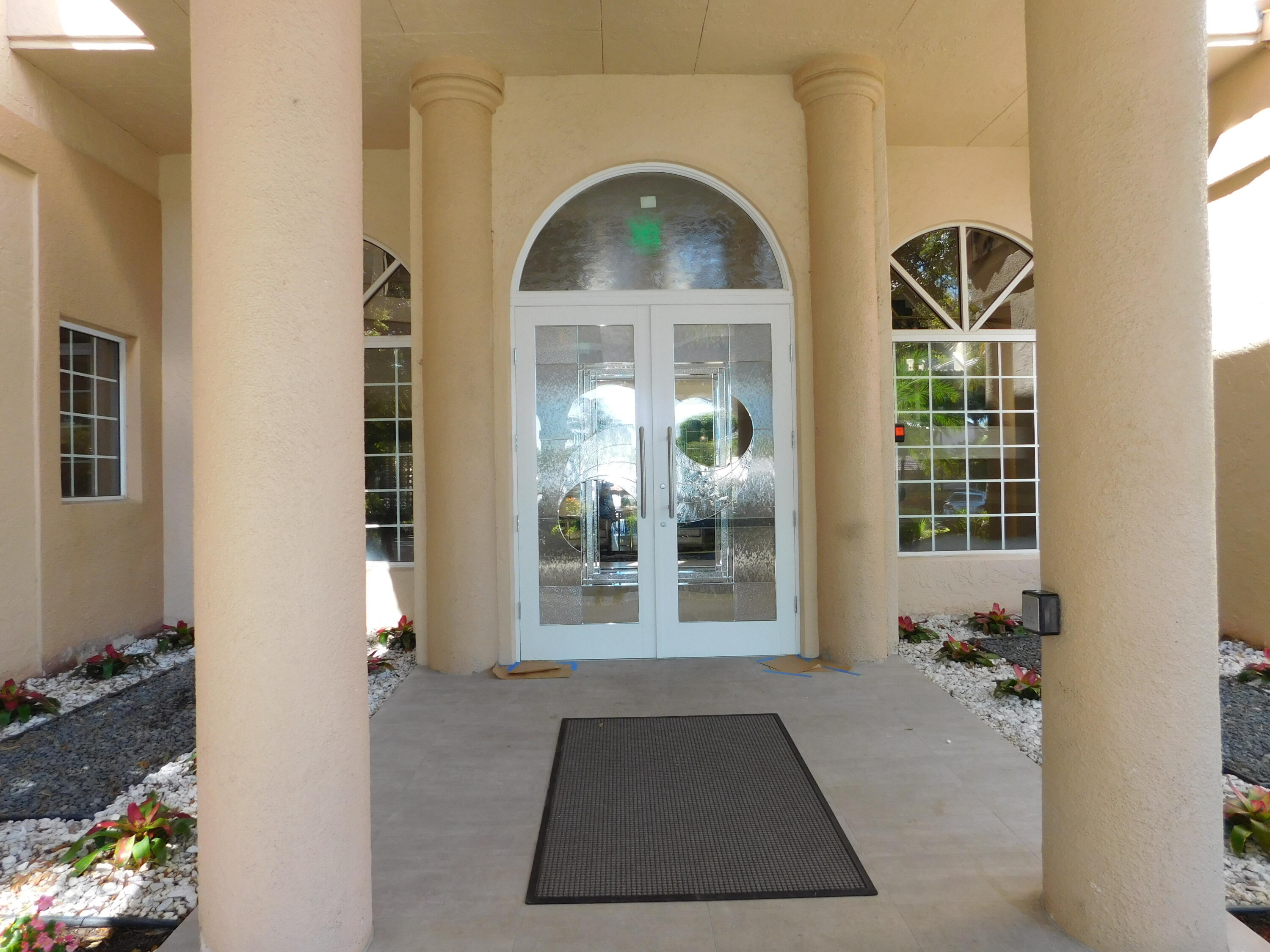 5235 Europa Drive, Unit E Boynton Beach, FL 33437 - Photo 32 of 57 a view of living room and window