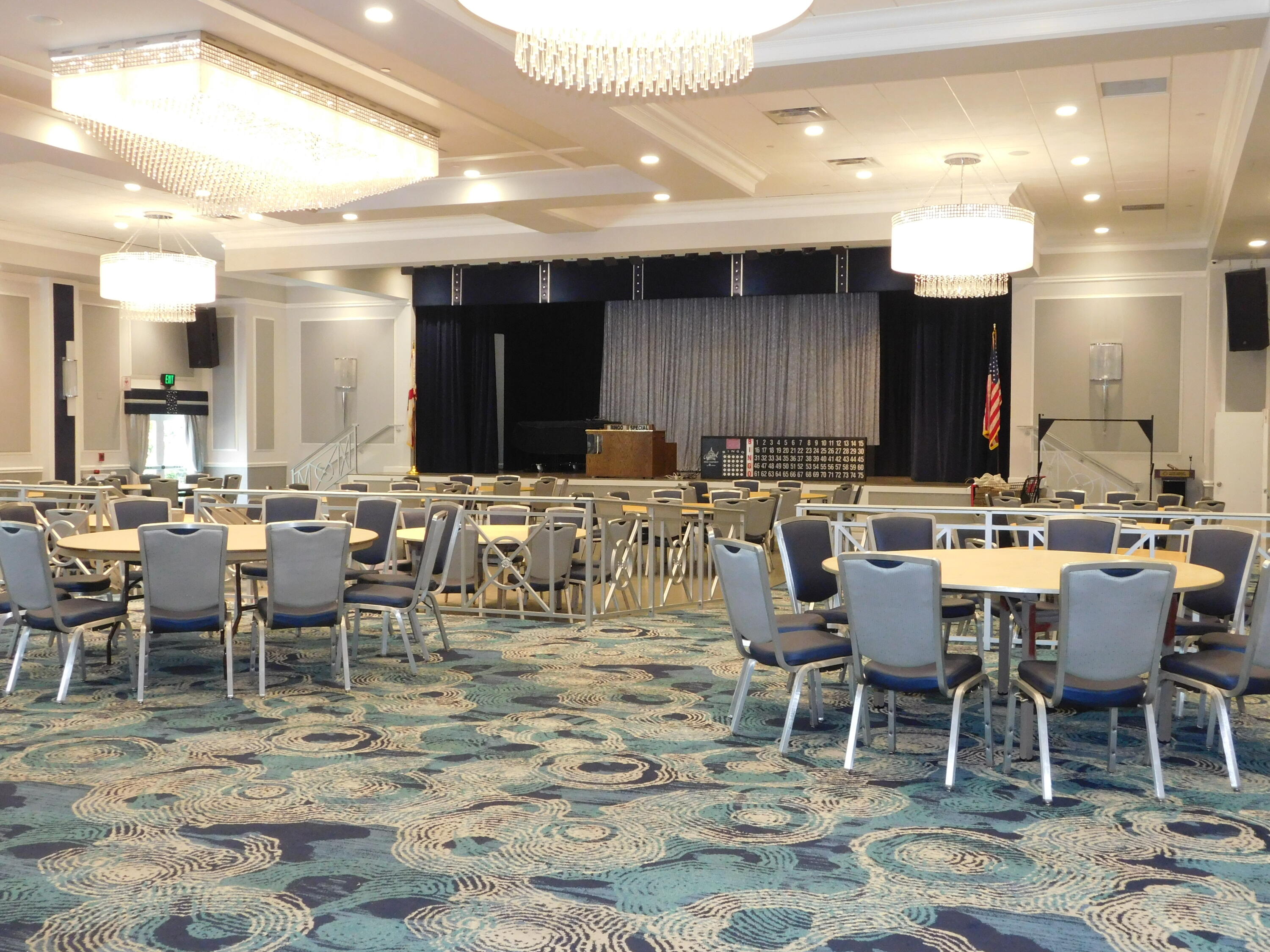 5235 Europa Drive, Unit E Boynton Beach, FL 33437 - Photo 37 of 57 a dining hall with lots of tables and chairs