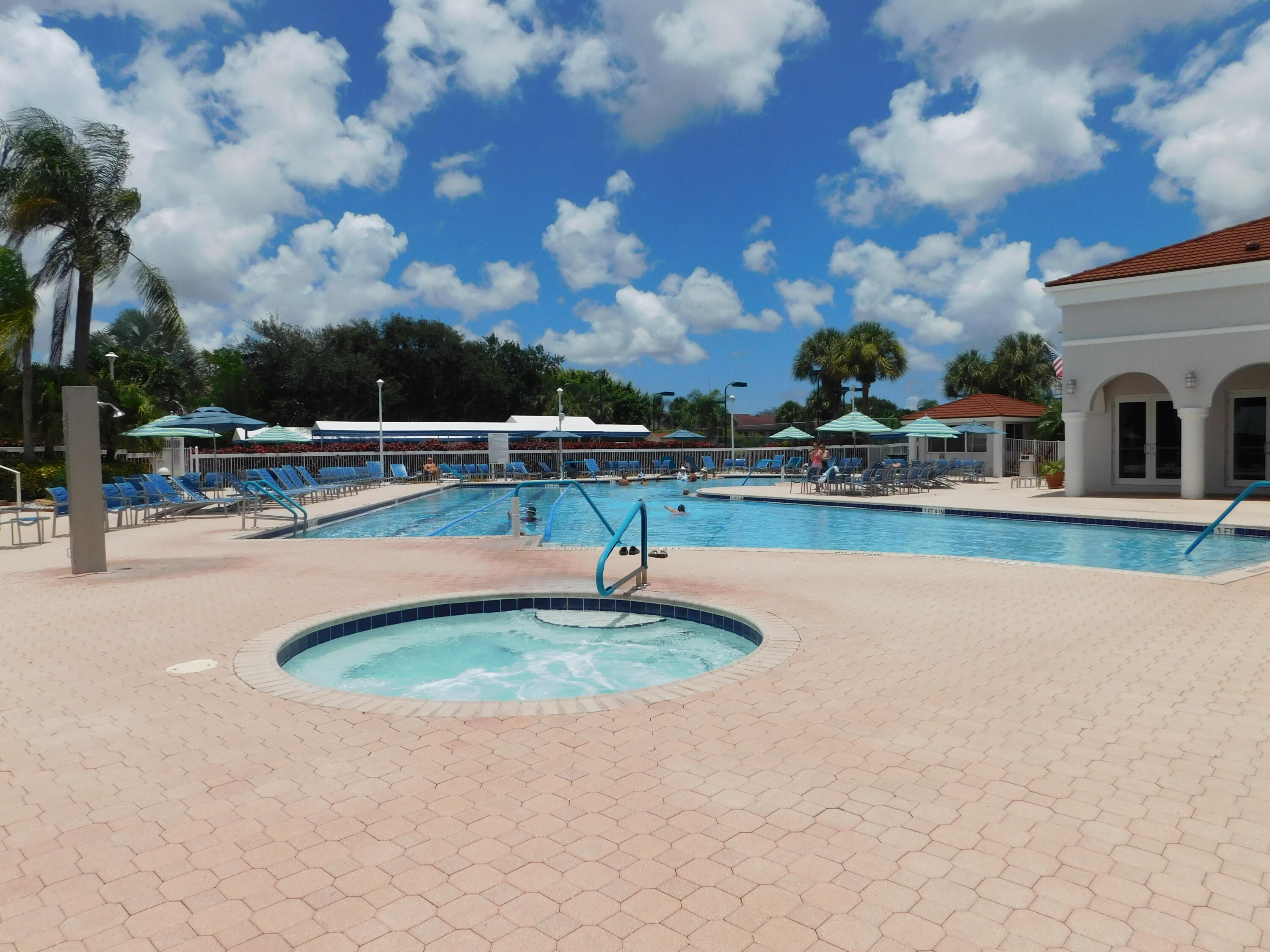 5235 Europa Drive, Unit E Boynton Beach, FL 33437 - Photo 42 of 57 swimming pool view with sitting space
