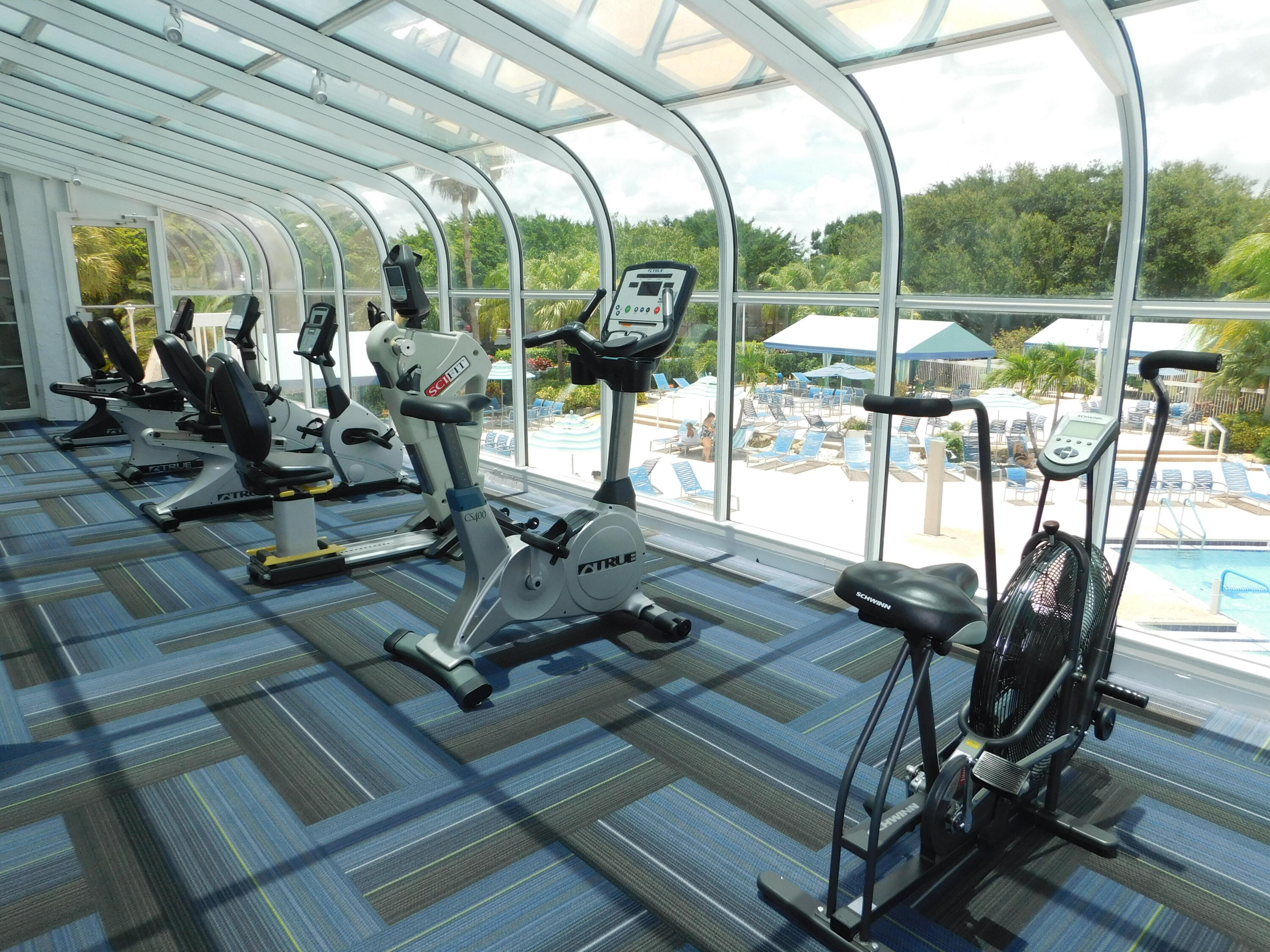 5235 Europa Drive, Unit E Boynton Beach, FL 33437 - Photo 47 of 57 a view of a room with gym equipment