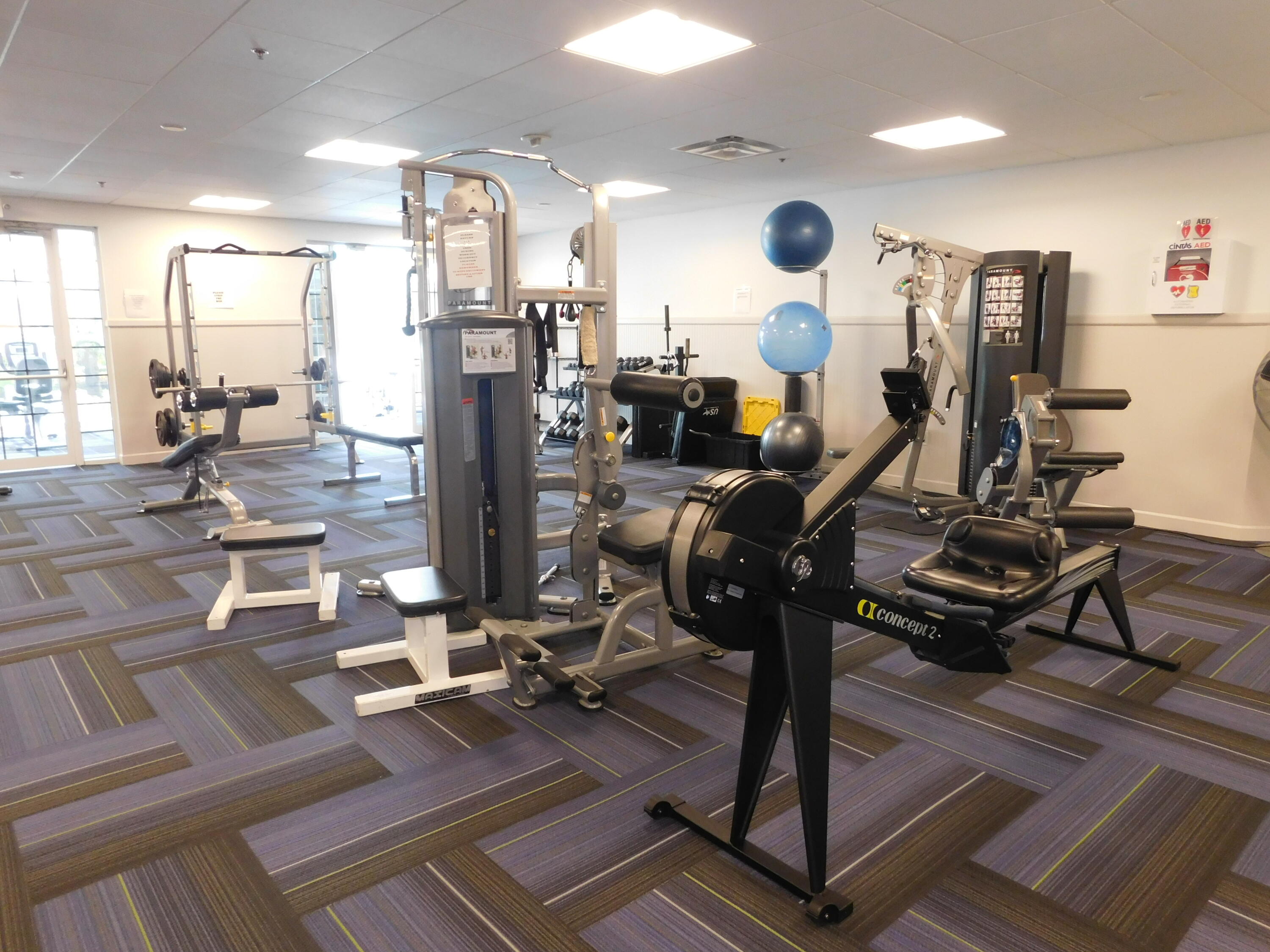 5235 Europa Drive, Unit E Boynton Beach, FL 33437 - Photo 49 of 57 a view of a room with gym equipment