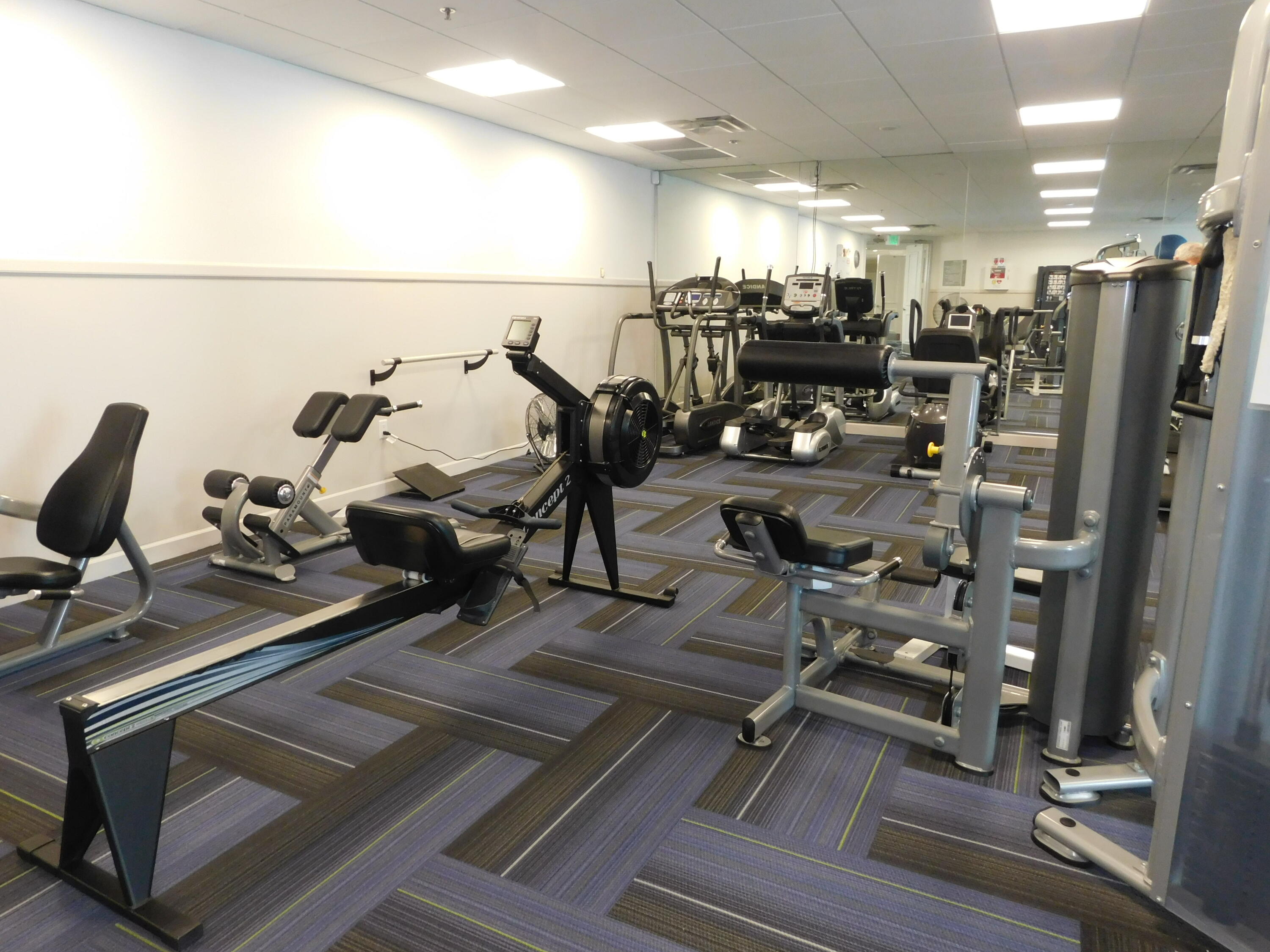 5235 Europa Drive, Unit E Boynton Beach, FL 33437 - Photo 50 of 57 a view of a room with gym equipment