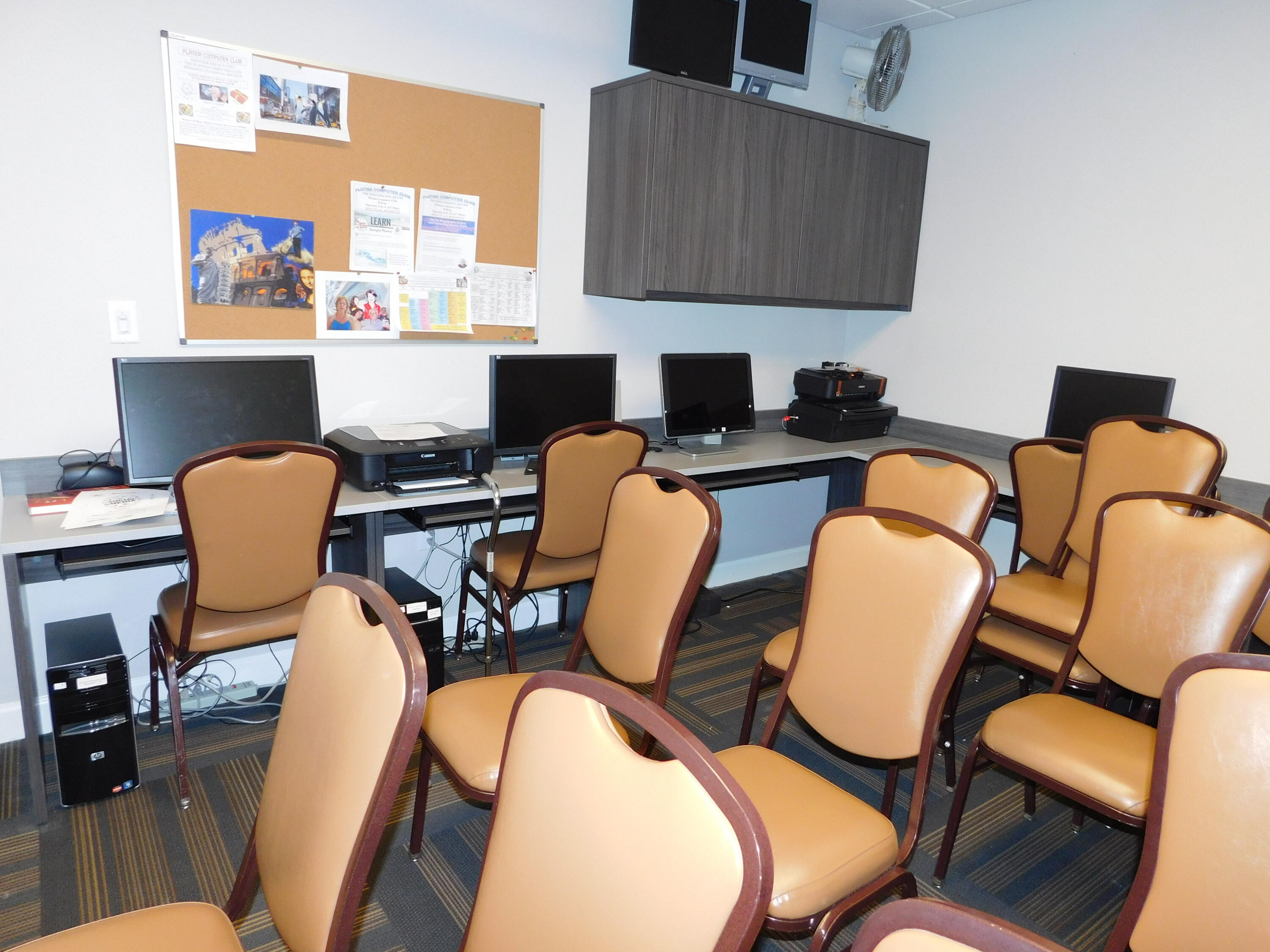 5235 Europa Drive, Unit E Boynton Beach, FL 33437 - Photo 56 of 57 a view of a dining room with furniture