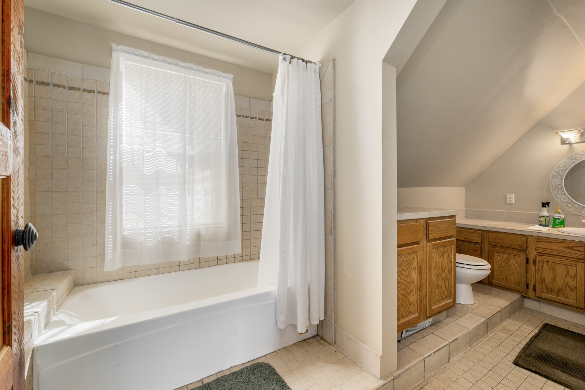 278 Captain Point Silver Point, TN 38582 - Photo 27 of 41 a bathroom with a toilet and a bathtub
