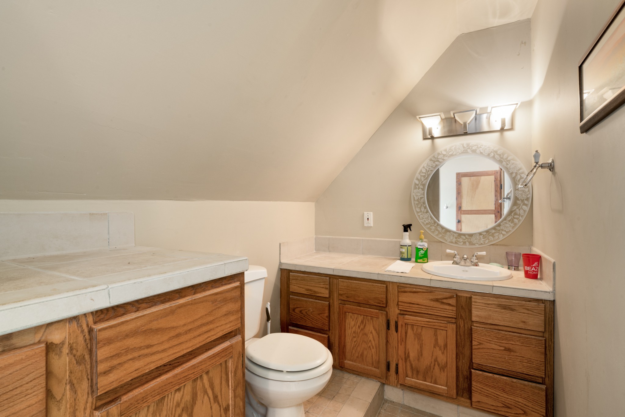 278 Captain Point Silver Point, TN 38582 - Photo 28 of 41 a bathroom with a toilet a sink and mirror