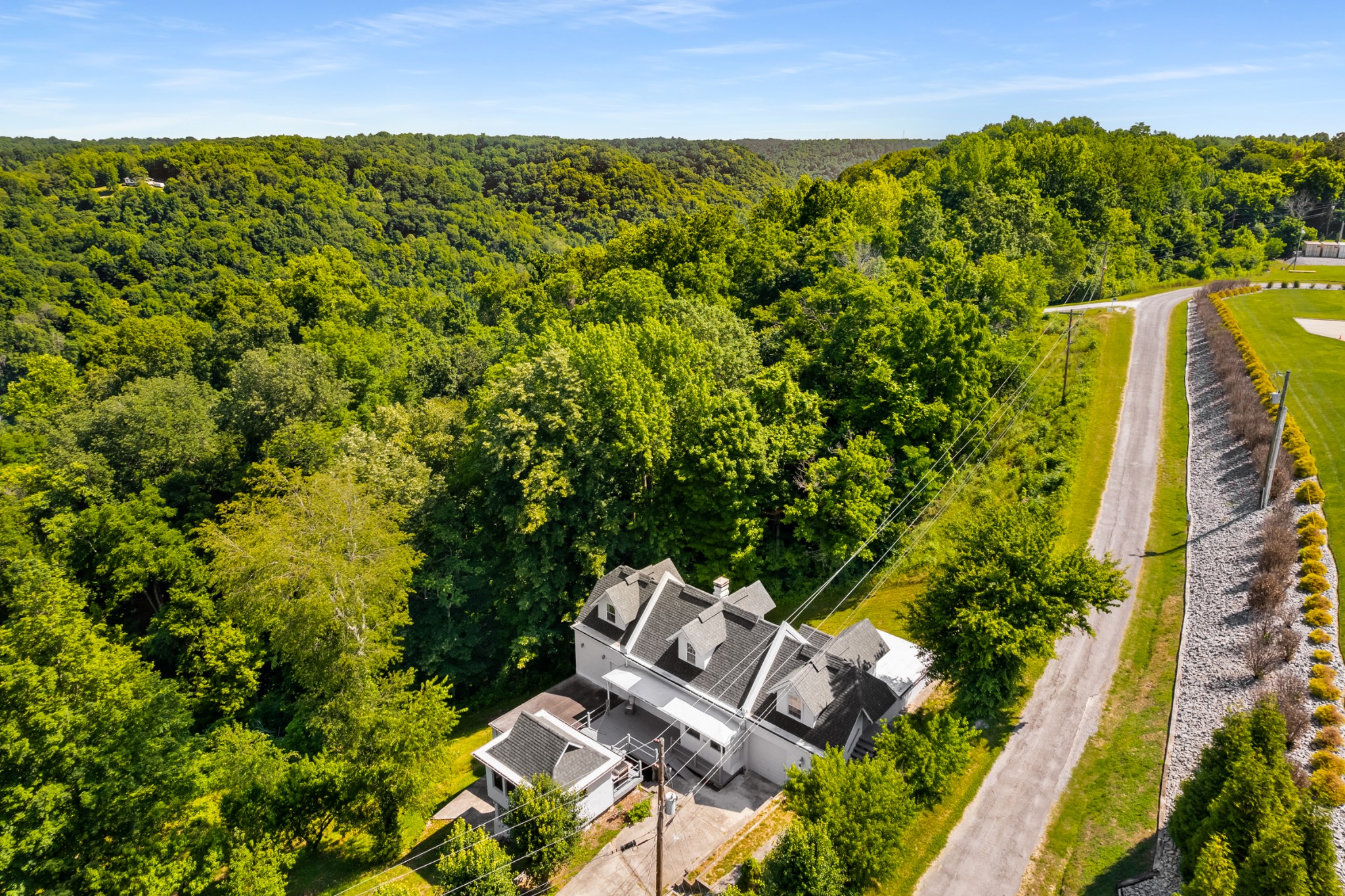 278 Captain Point Silver Point, TN 38582 - Photo 40 of 41 an aerial view of a house with a yard