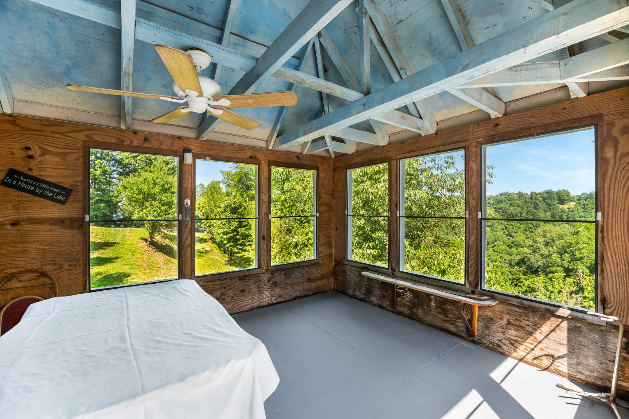 278 Captain Point Silver Point, TN 38582 - Photo 10 of 41 a bed sitting in a bedroom next to a large window