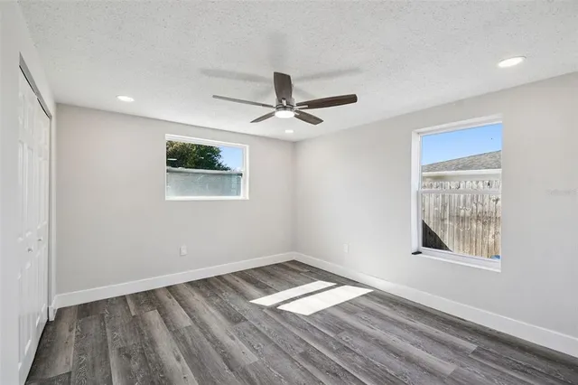 a view of a dry yard with an outdoor space
